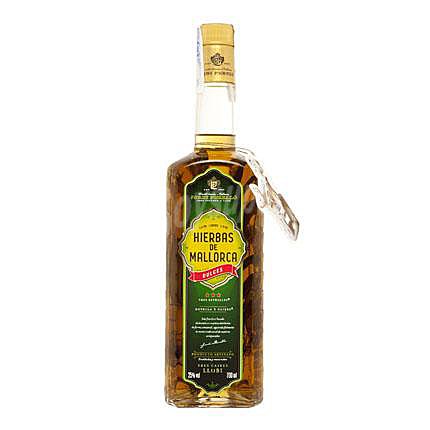 Licor de hierbas dulces Tres Caires